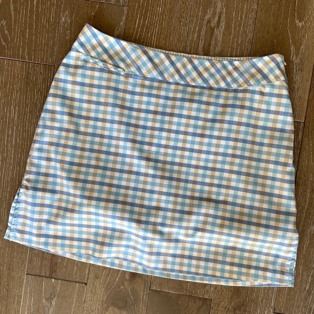 Adidas golf skirt, size 10 blue plaid pattern
